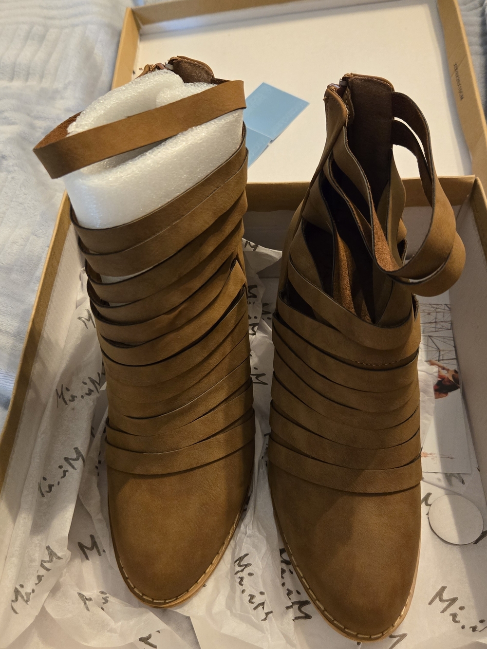 Miracle Miles Urban-04 brown strappy cutout ankle booties.